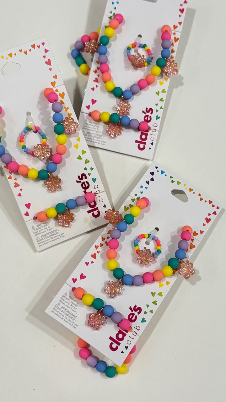 Claire’s beaded multi bracelet necklace and ring set with hanging flower charms