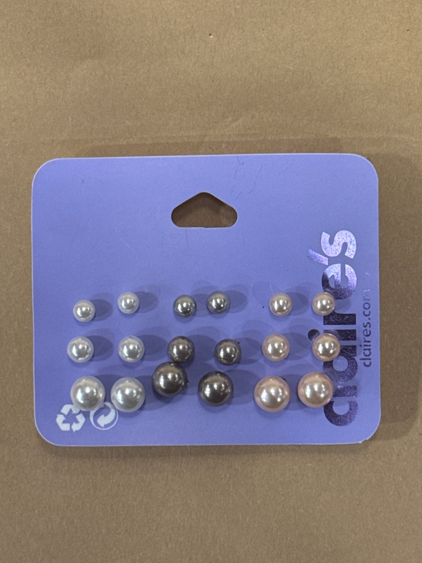 Claire’s multi size pearl grey and rose gold studs