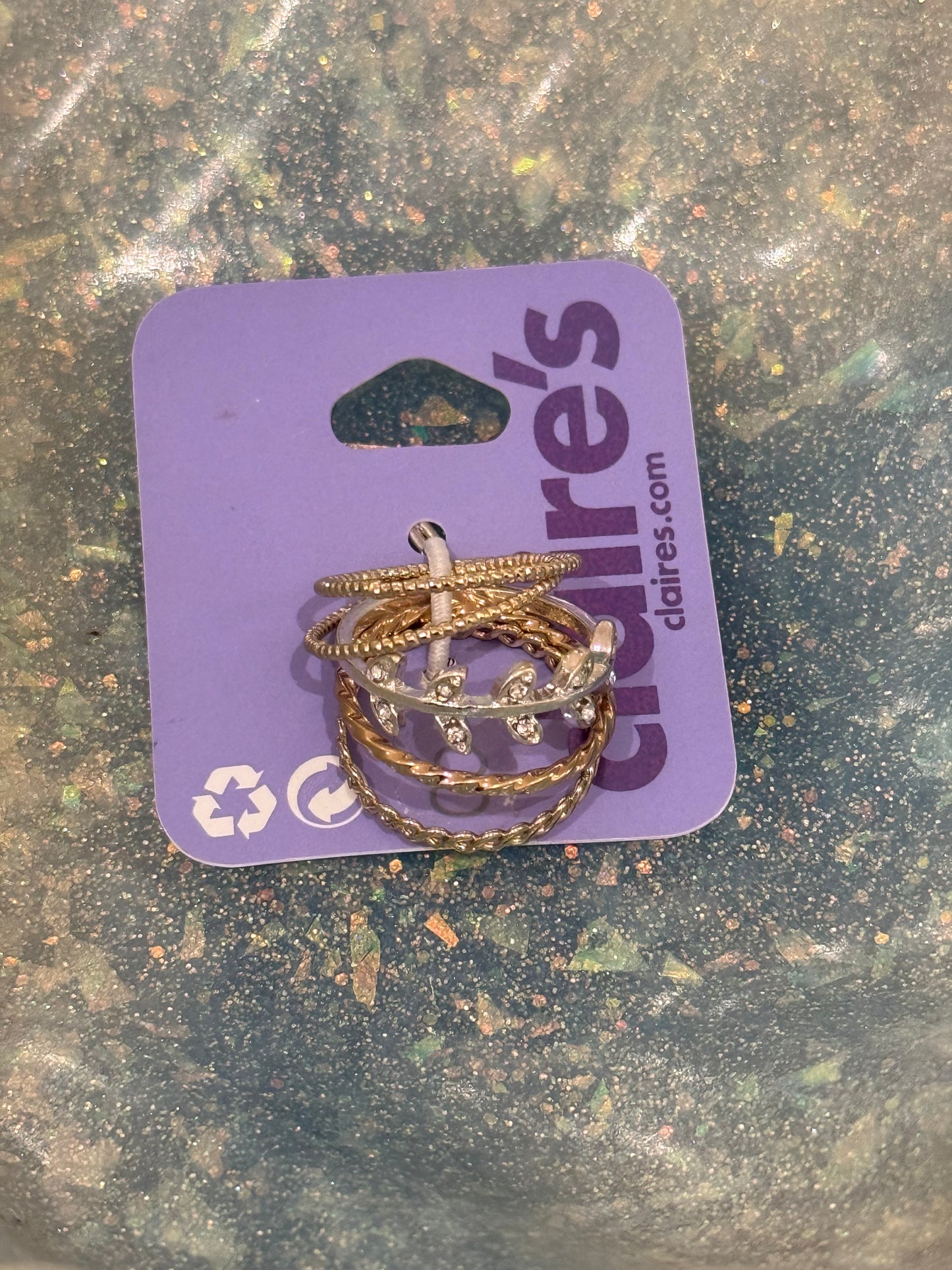 Claire’s delicate Greek Ring Stack
