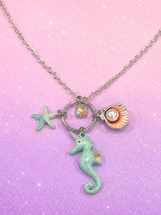 Justice by Walmart seahorse starfish and seashell pendant necklace