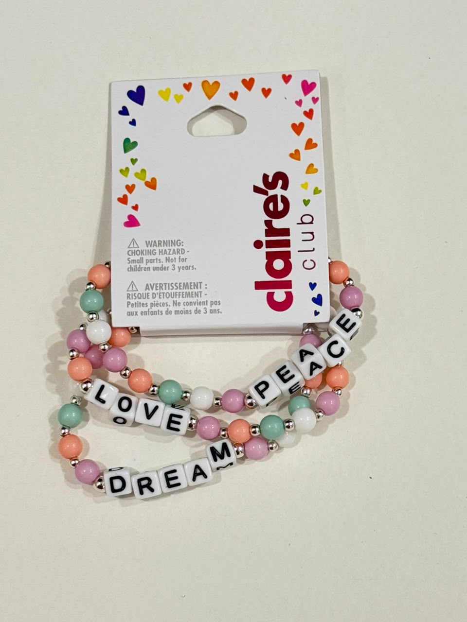 Claire’s pastel beaded pack of 3 peace dream and love adjustable bracelet