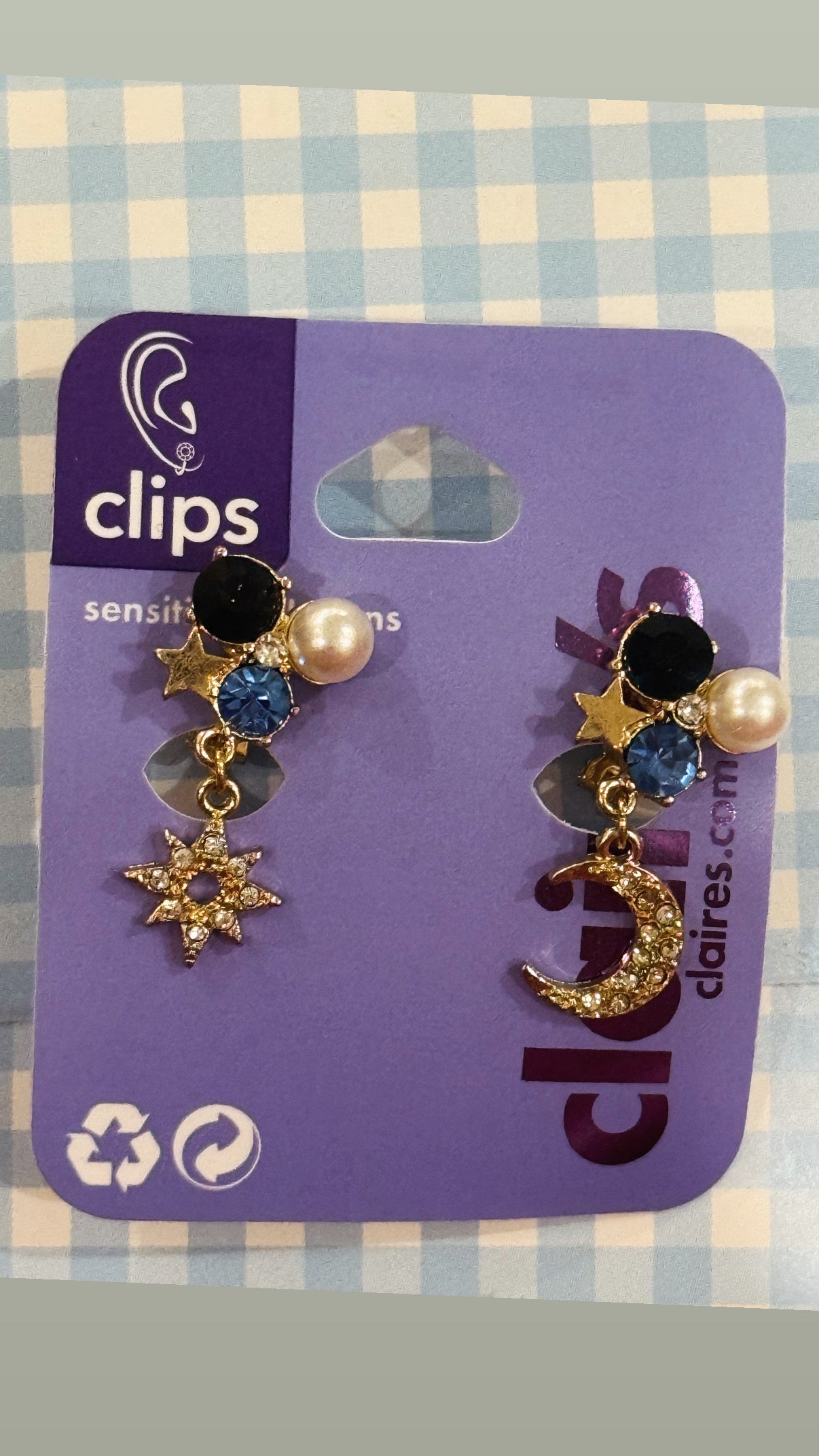 Claire’s celestial dangler earrings with clip