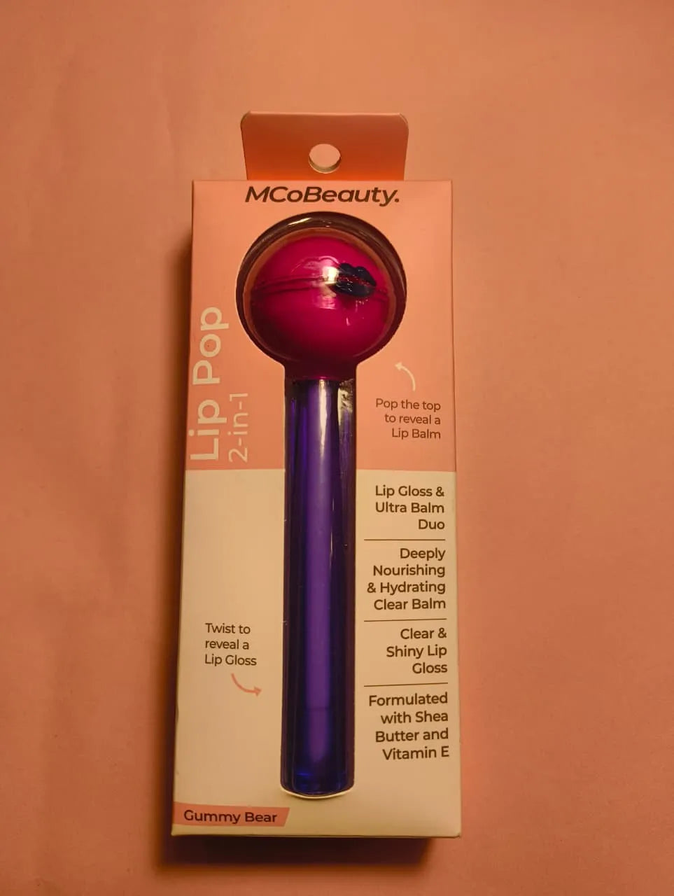Mco Beauty Lip POp 2-in-1 lip gloss and lip balm duo in gummy bear flavor, featuring shiny and nourishing formula.