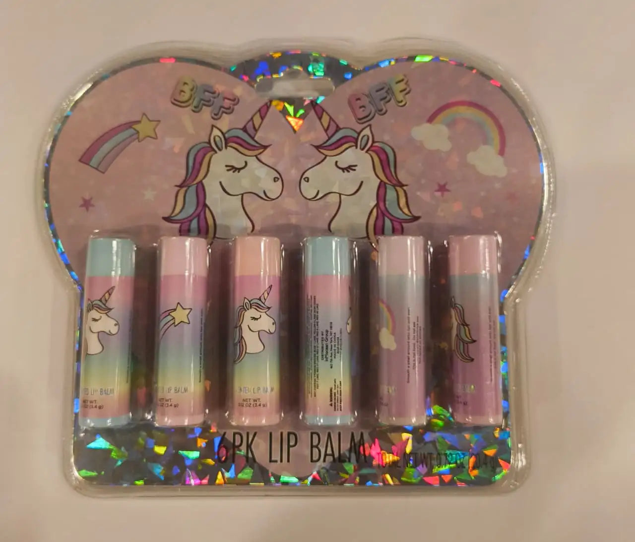Set of 6 lip balms in a packaging with unicorn designs and 'BFF' text.